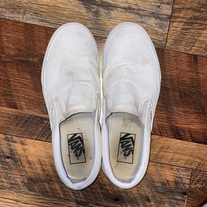 Used white slip-on vans
